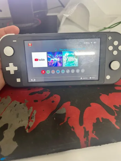 Nintendo Switch Lite + Zelda O